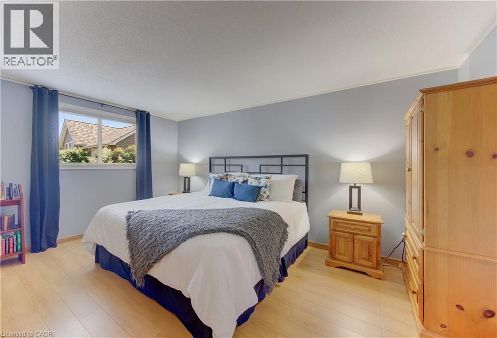 Primary Bedroom, with walk-in closet and direct access to bathroom - 7 Kilkerran Crescent, Kitchener, ON - Indoor Photo Showing Bedroom