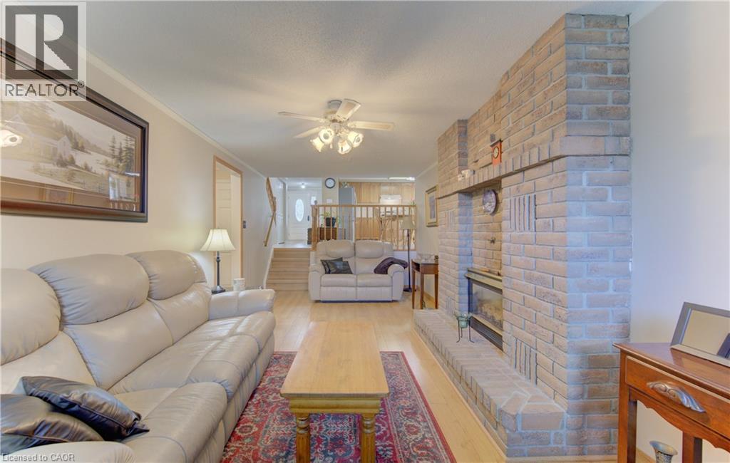 So much space for the whole family! - 7 Kilkerran Crescent, Kitchener, ON - Indoor Photo Showing Living Room With Fireplace