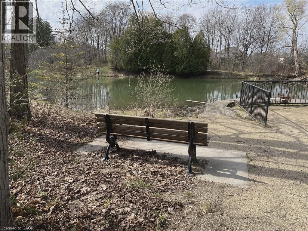 Relaxing pond-side seating area. - 7 Kilkerran Crescent, Kitchener, ON - Outdoor