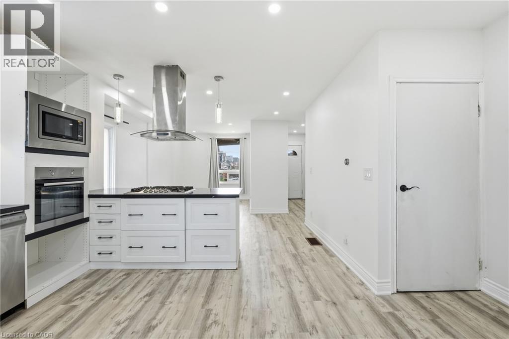 Bright beautiful kitchen with built-in appliances. - 73 Gertrude Street, Hamilton, ON - Indoor Photo Showing Other Room