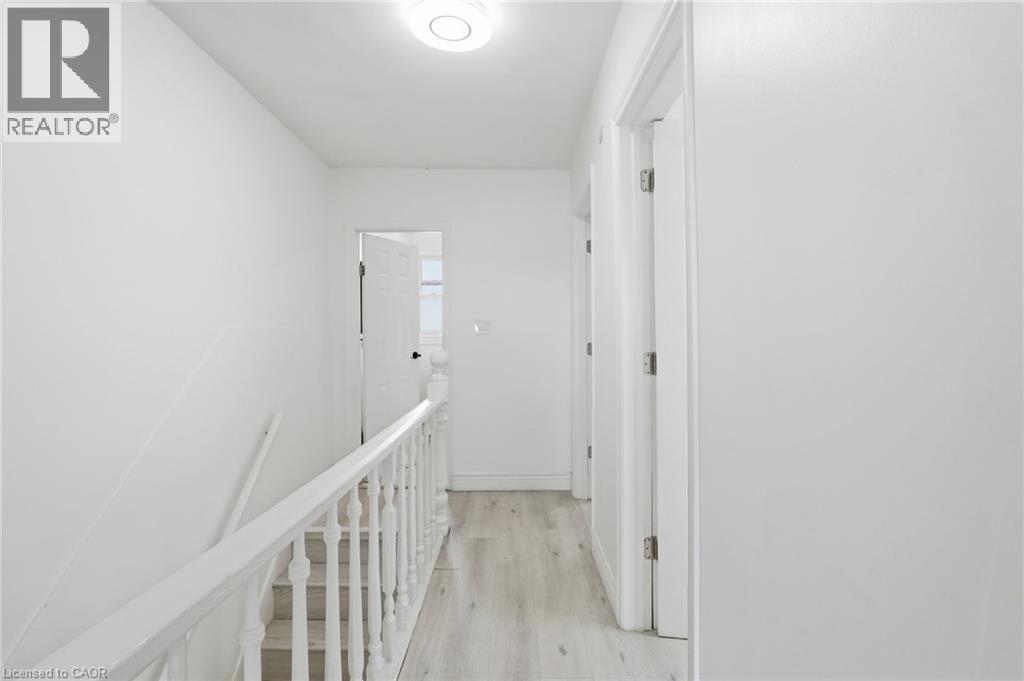 Brightly lit upper hallway. - 73 Gertrude Street, Hamilton, ON - Indoor Photo Showing Other Room