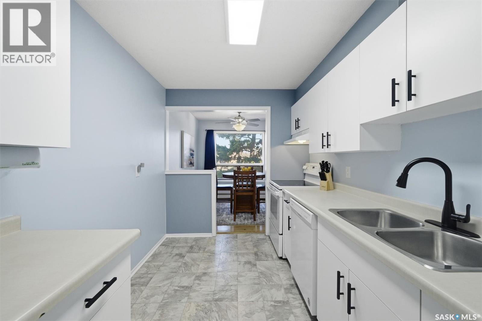 223 217B Cree Place, Saskatoon, SK - Indoor Photo Showing Kitchen With Double Sink