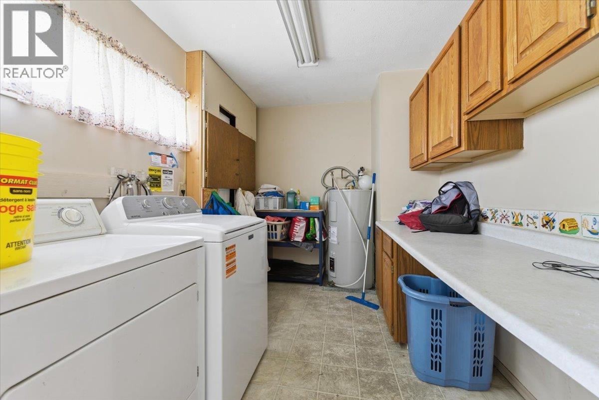 8163 Buchanan Road, Coldstream, BC - Indoor Photo Showing Laundry Room