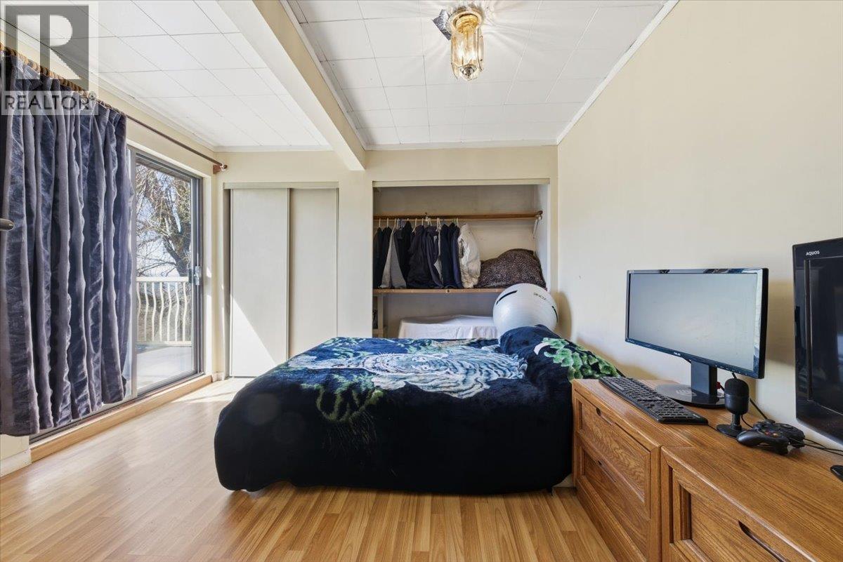 8163 Buchanan Road, Coldstream, BC - Indoor Photo Showing Bedroom