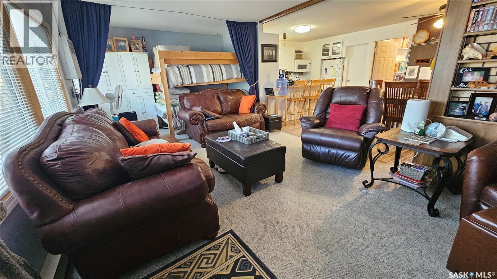 97 Ferguson Bay, Reid Lake, SK - Indoor Photo Showing Living Room