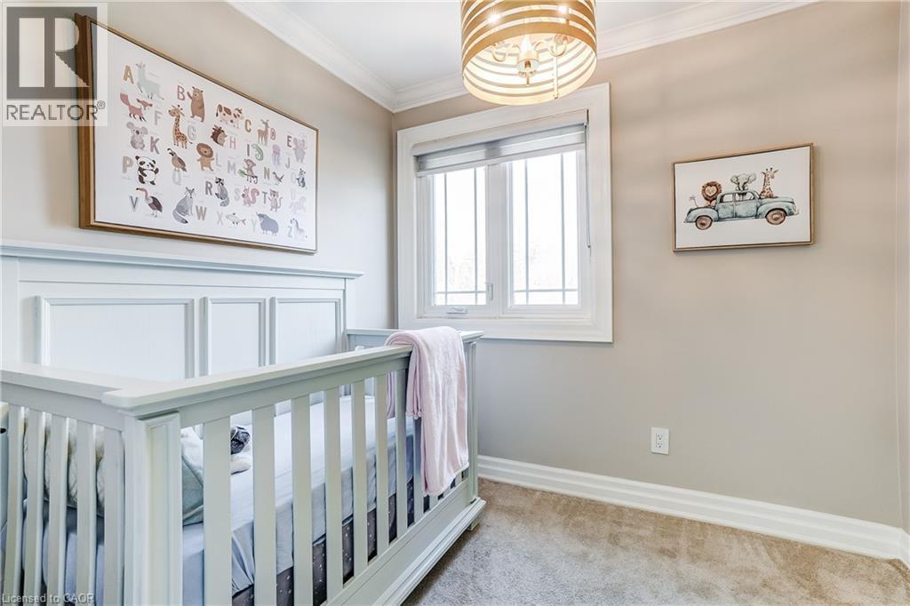 Neutral-toned room featuring crown molding, a window with horizontal grids, and carpet flooring - 1264 Kane Road, Mississauga, ON - Indoor Photo Showing Other Room