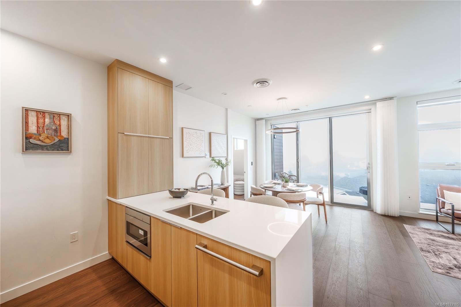 #307-9570 Fifth St, Sidney, BC - Indoor Photo Showing Kitchen With Double Sink