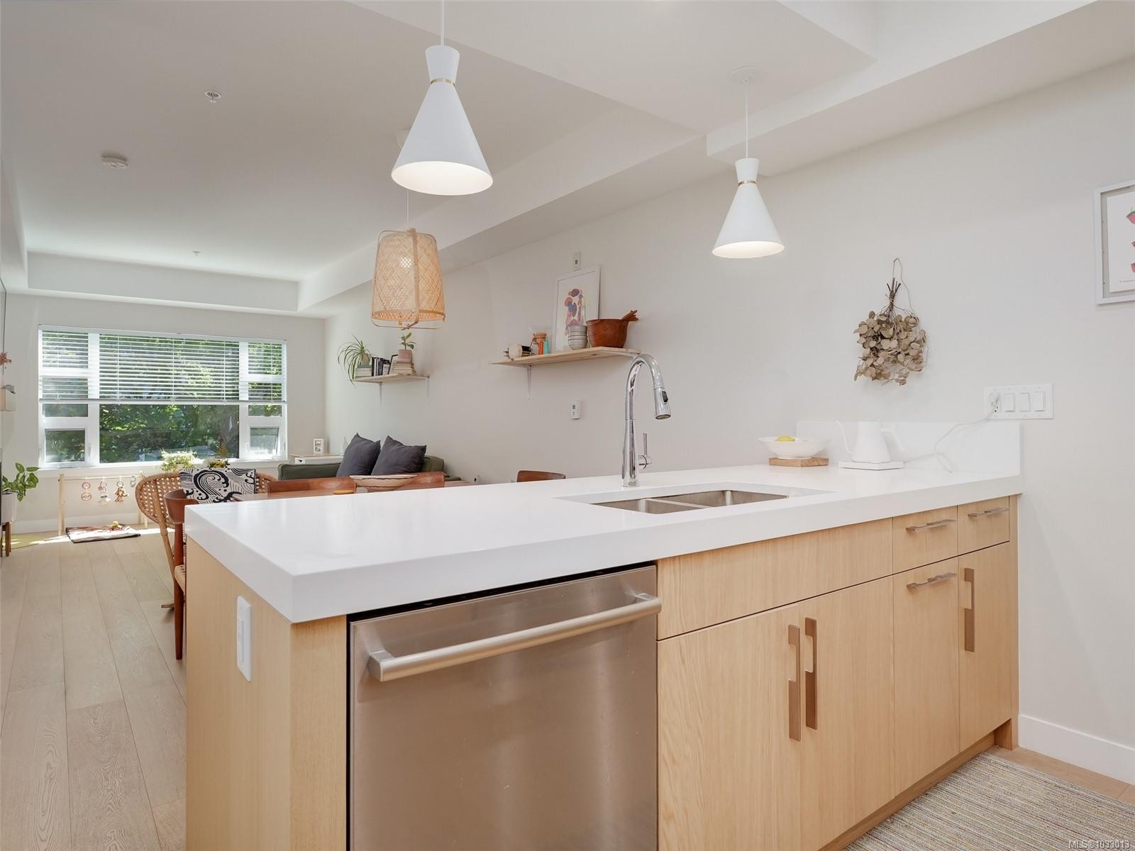 206-9861 Third St, Sidney, BC - Indoor Photo Showing Kitchen With Double Sink