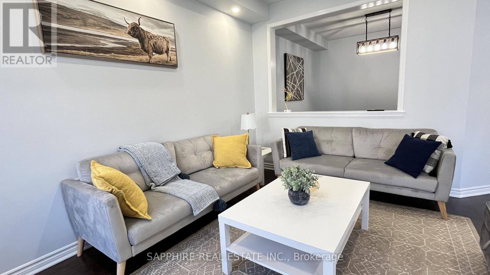 Family room overlooking Living - 325 Trudeau Drive E, Milton, ON - Indoor Photo Showing Living Room