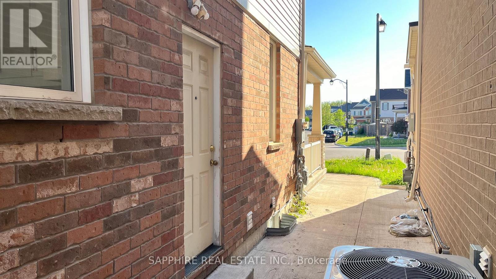 Side Entrance - 325 Trudeau Drive E, Milton, ON - Outdoor With Exterior