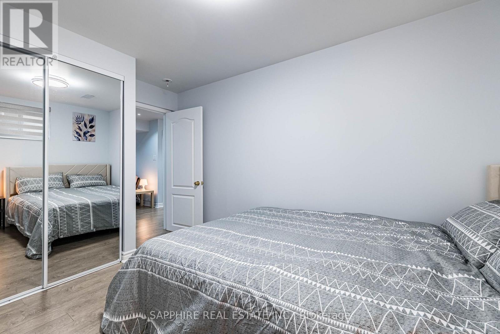 Basement Bedroom 1 with Closet - 325 Trudeau Drive E, Milton, ON - Indoor Photo Showing Bedroom