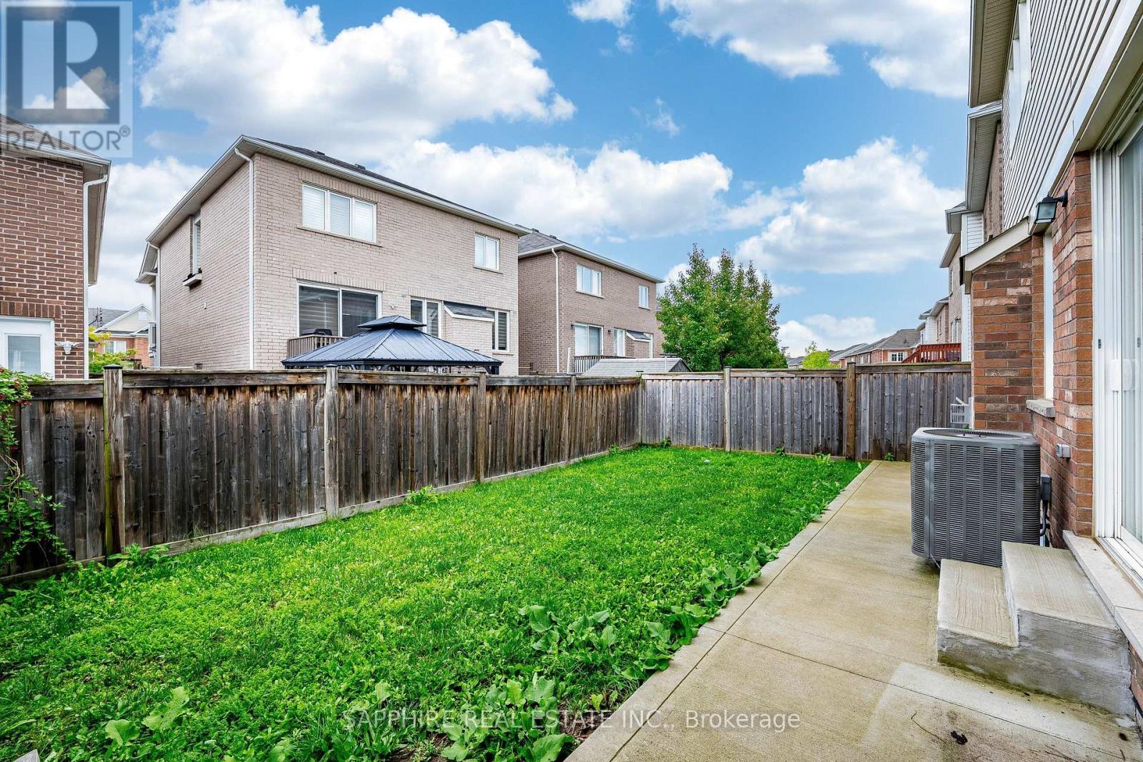 Large Backyard with Concrete - 325 Trudeau Drive E, Milton, ON - Outdoor
