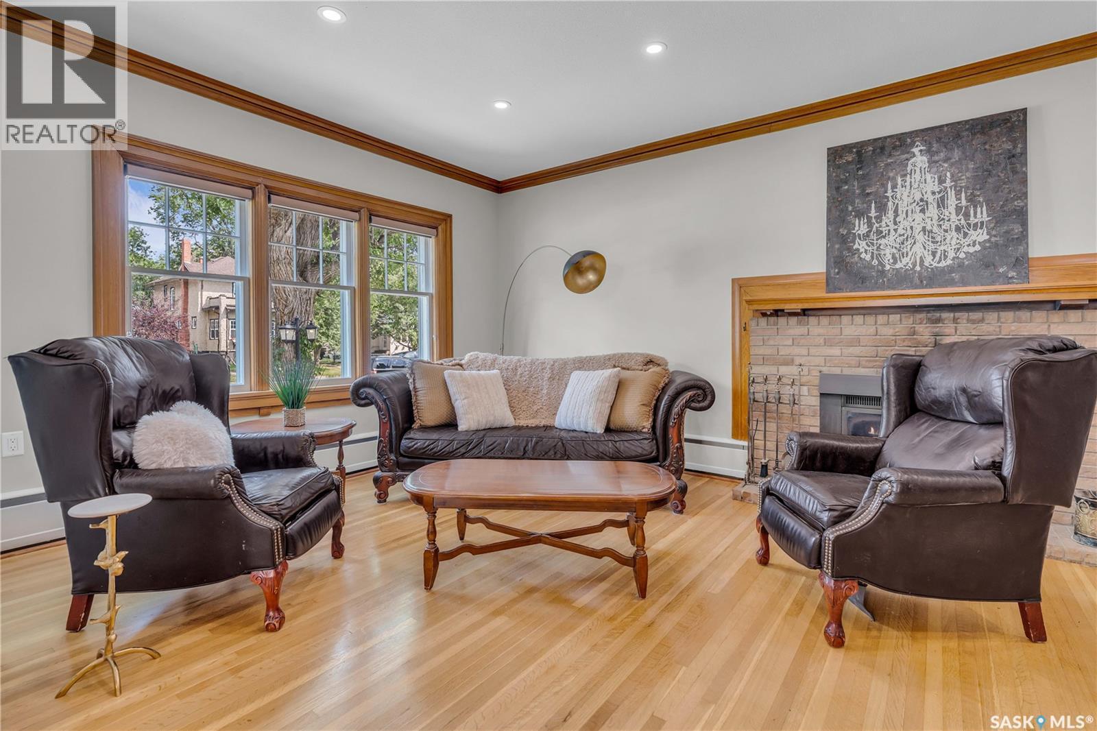 3120 Rae Street, Regina, SK - Indoor Photo Showing Living Room With Fireplace