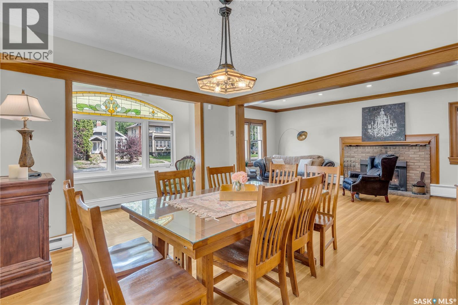 3120 Rae Street, Regina, SK - Indoor Photo Showing Dining Room With Fireplace