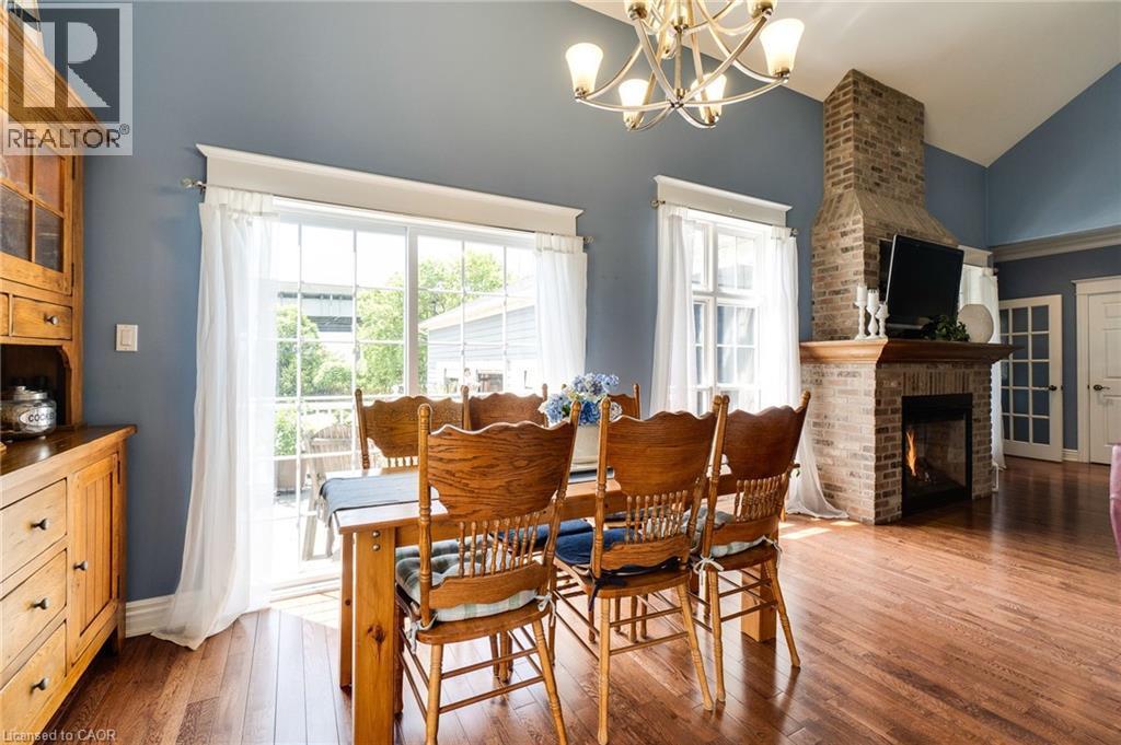 1026 Beach Boulevard, Hamilton, ON - Indoor Photo Showing Dining Room With Fireplace