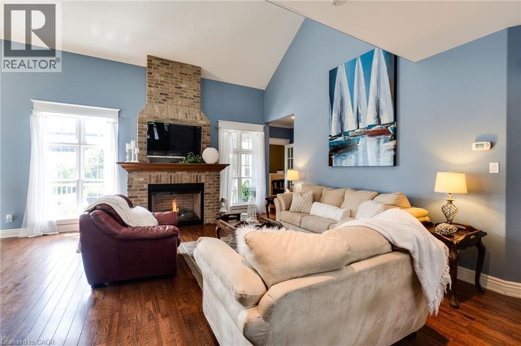 1026 Beach Boulevard, Hamilton, ON - Indoor Photo Showing Living Room With Fireplace
