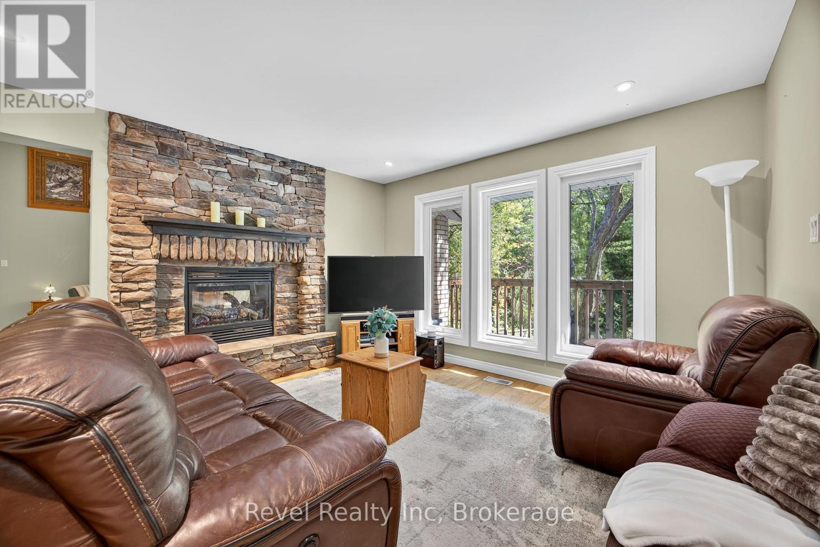 7190 93 Highway, Tiny, ON - Indoor Photo Showing Living Room With Fireplace
