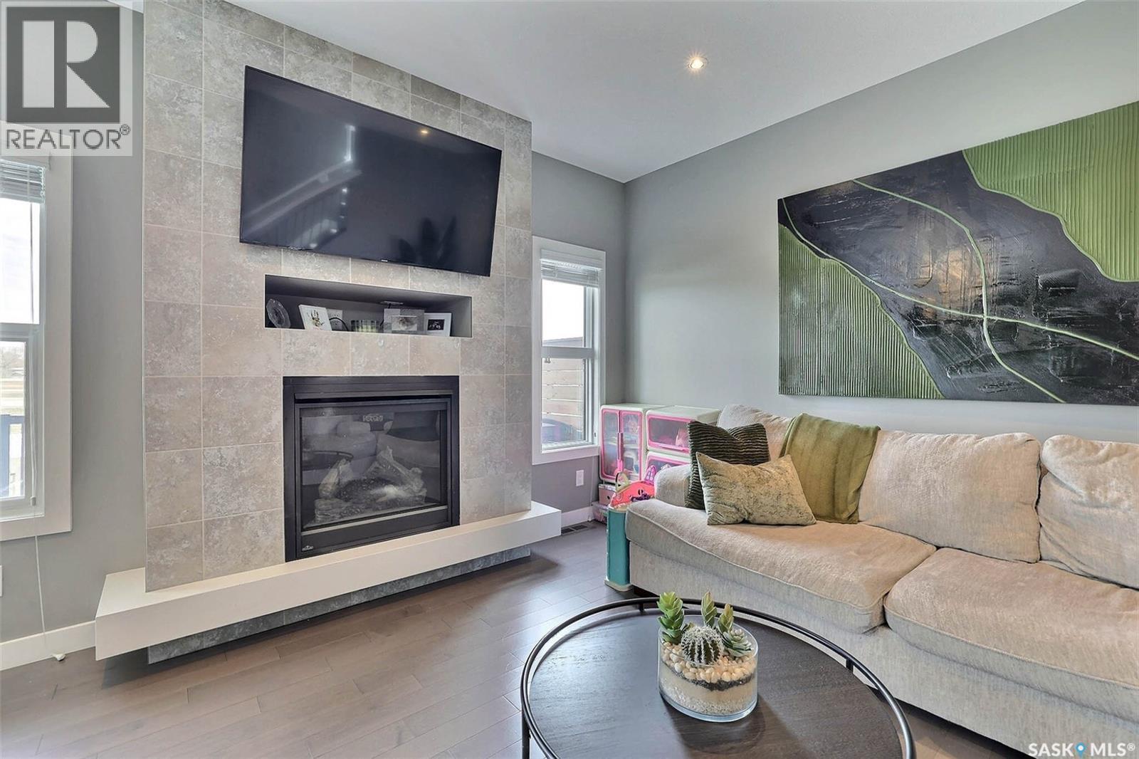 2621 Makowsky Crescent, Regina, SK - Indoor Photo Showing Living Room With Fireplace