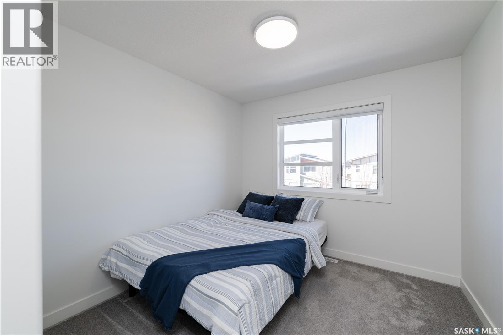 5617 Tutor Way, Regina, SK - Indoor Photo Showing Bedroom