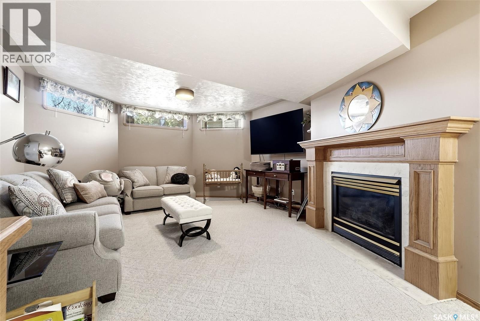 3524 Canterbury Place E, Regina, SK - Indoor With Fireplace