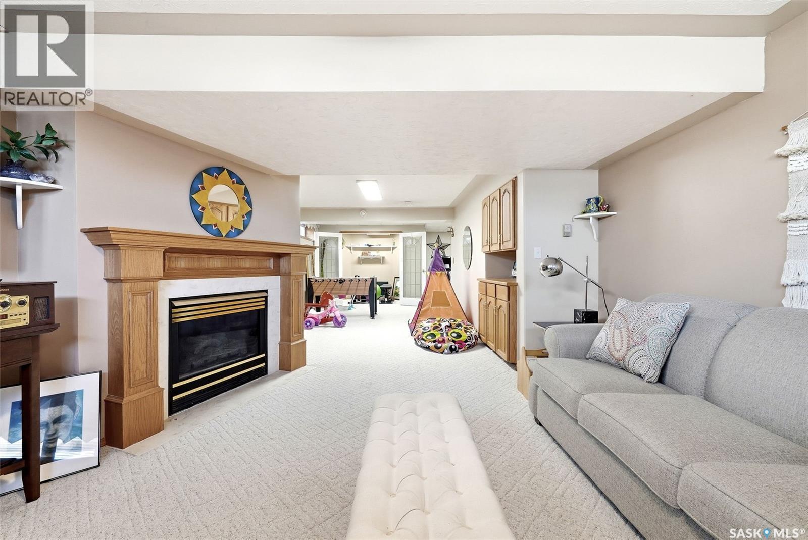 3524 Canterbury Place E, Regina, SK - Indoor With Fireplace