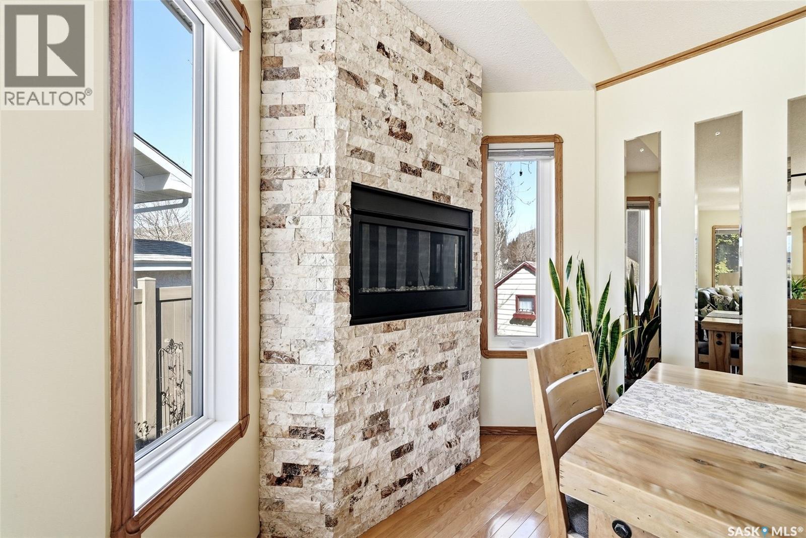 3524 Canterbury Place E, Regina, SK - Indoor With Fireplace
