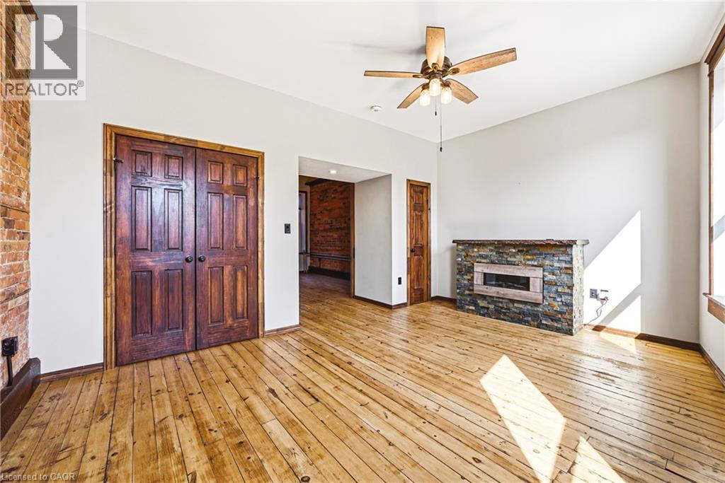 593 & 595 E King Street E, Hamilton, ON - Indoor Photo Showing Living Room With Fireplace