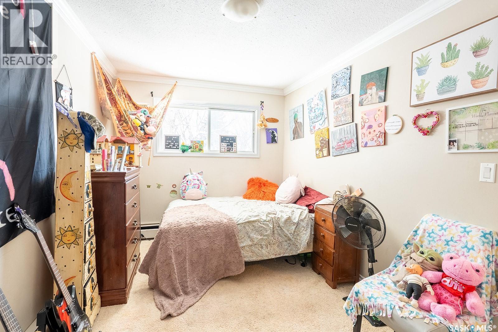 B 1014 Colony Street, Saskatoon, SK - Indoor Photo Showing Bedroom
