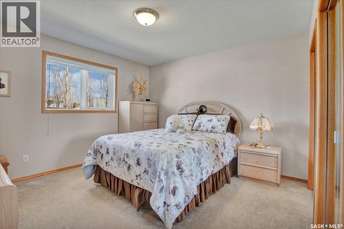 4 Crystal Villa, Warman, SK - Indoor Photo Showing Bedroom