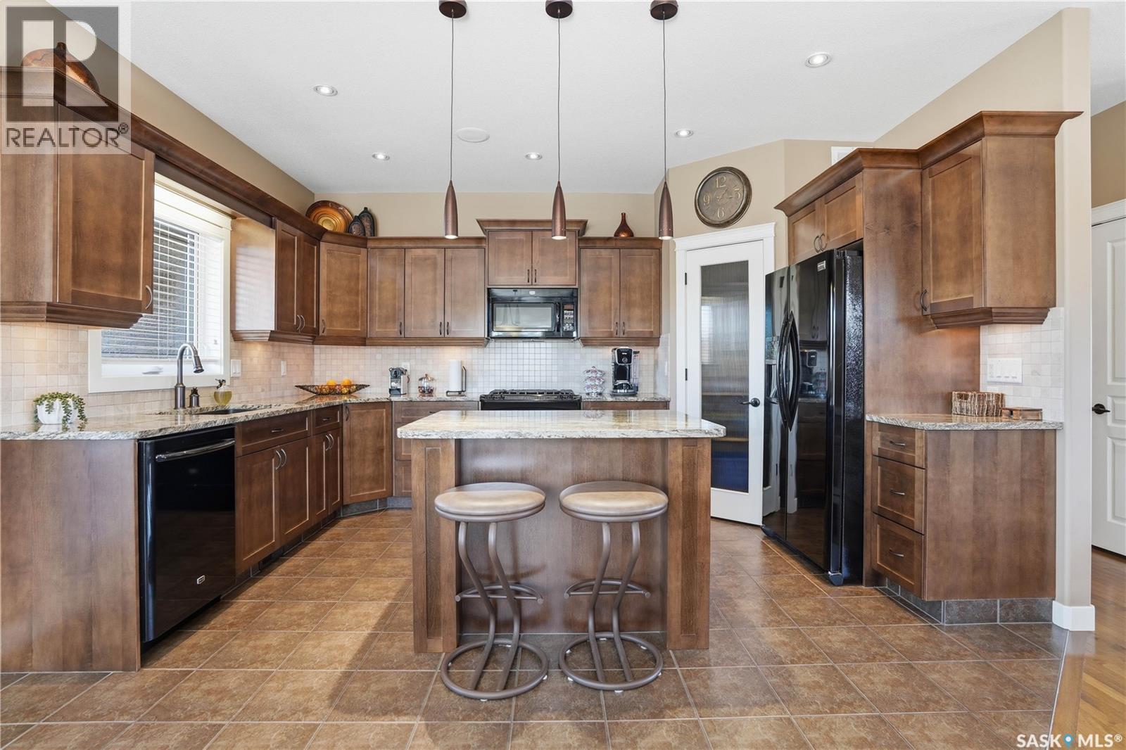 4150 Goldfinch Way, Regina, SK - Indoor Photo Showing Kitchen With Upgraded Kitchen