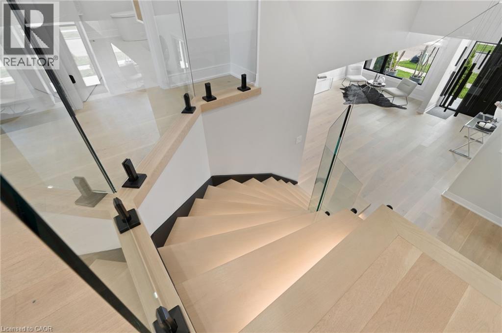 Staircase featuring wood finished floors - 17 Clearview Drive, Hamilton, ON - Indoor Photo Showing Other Room