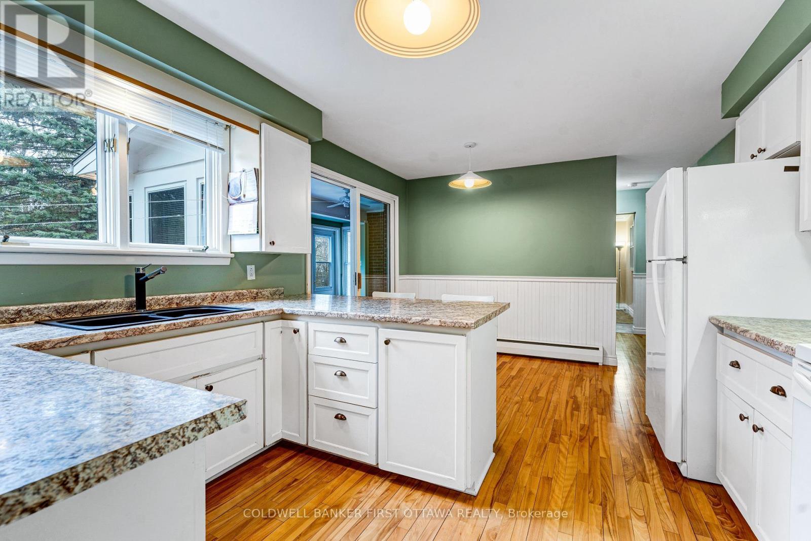 Window overlooks backyard - 12 Glenview Crescent, Perth, ON - Indoor Photo Showing Kitchen