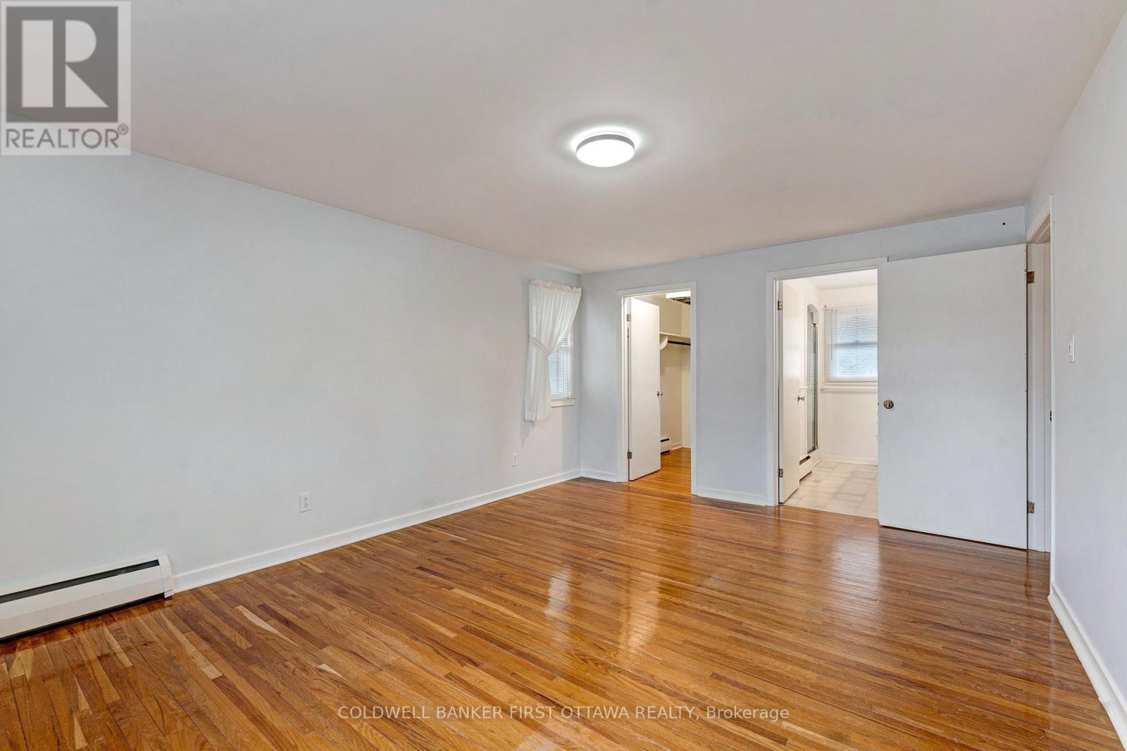 Primary suite access to walk-in closet & ensuite - 12 Glenview Crescent, Perth, ON - Indoor Photo Showing Other Room