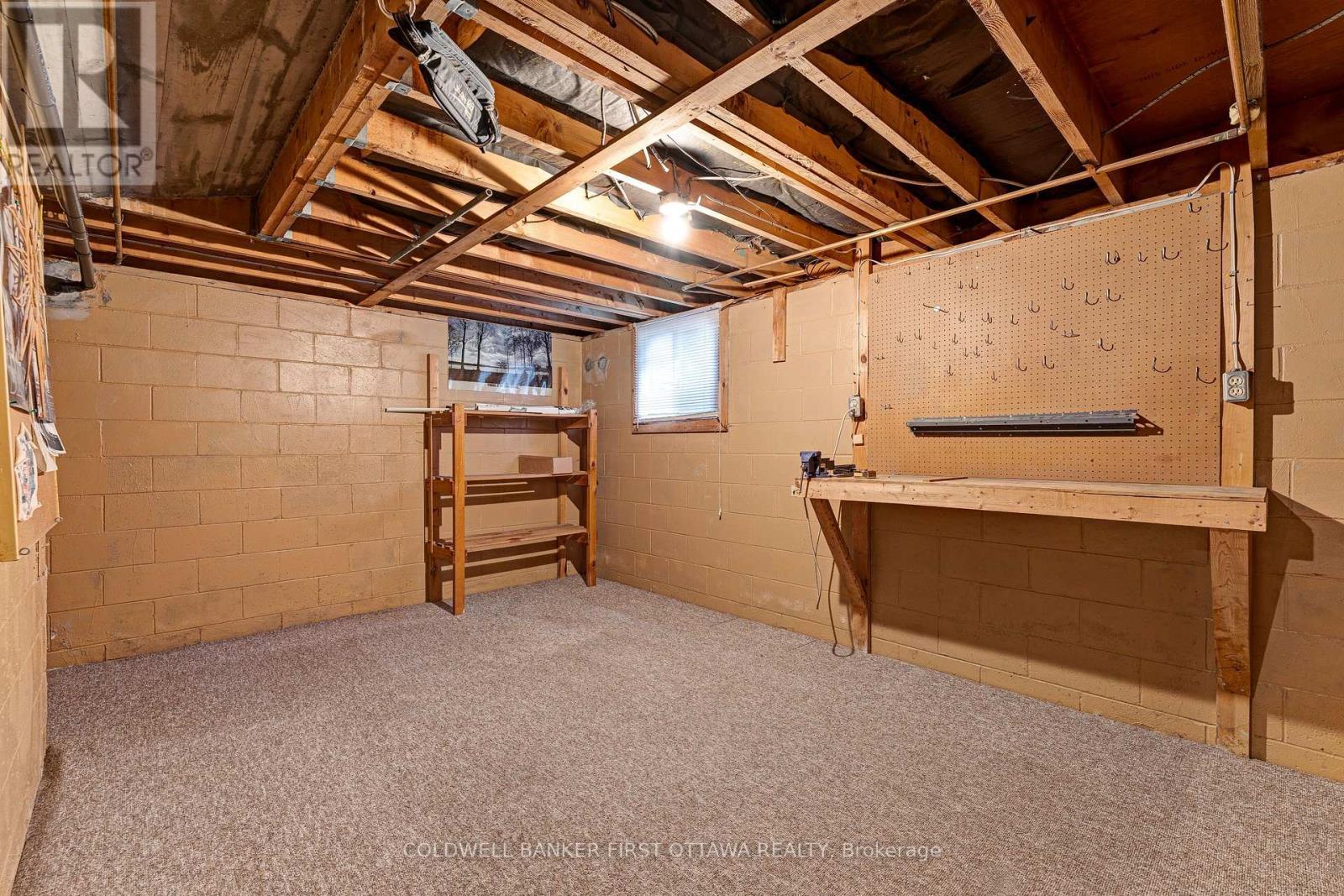 Lower level workshop or flex space - 12 Glenview Crescent, Perth, ON - Indoor Photo Showing Basement
