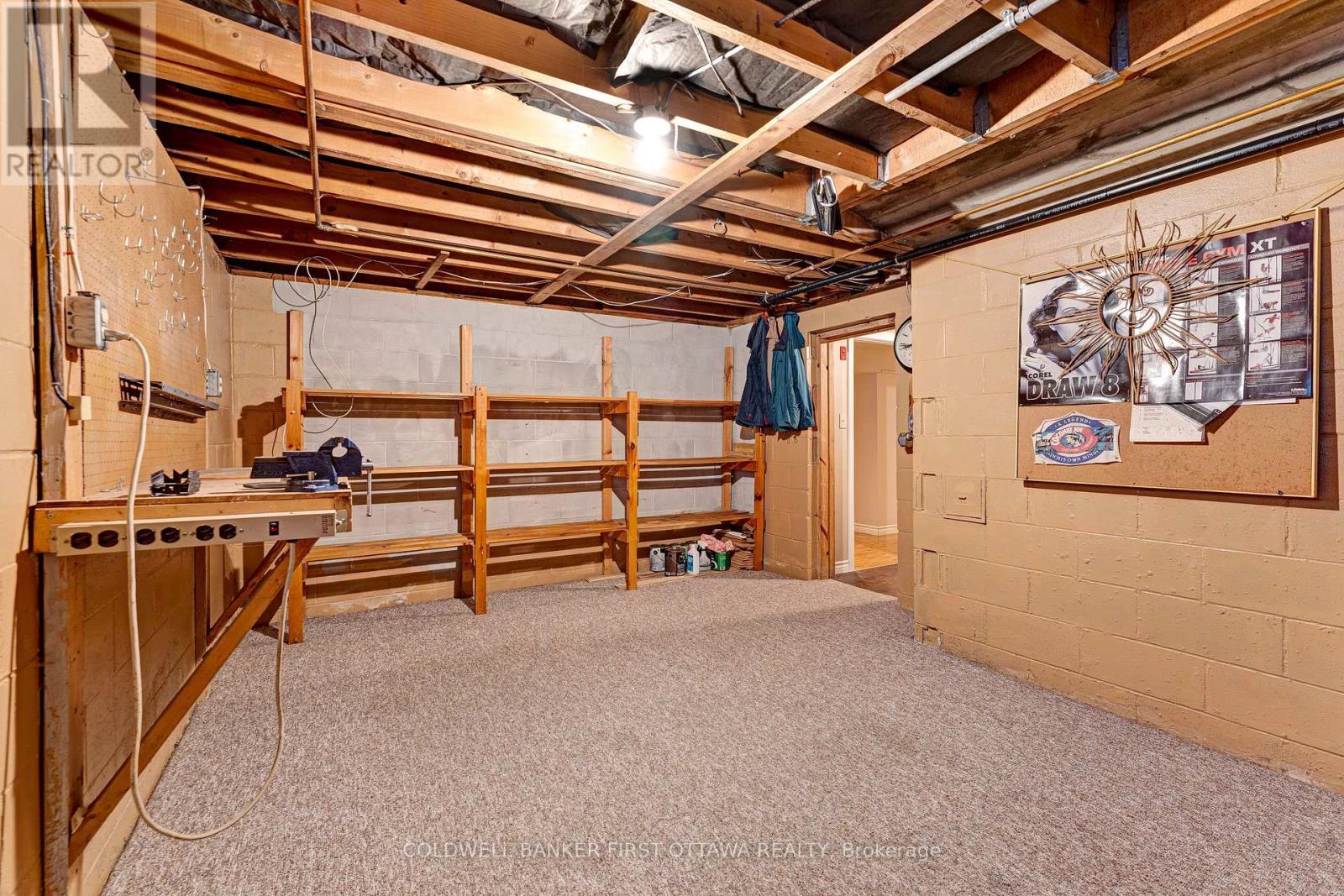 Workshop shelving and workbench included - 12 Glenview Crescent, Perth, ON - Indoor Photo Showing Basement