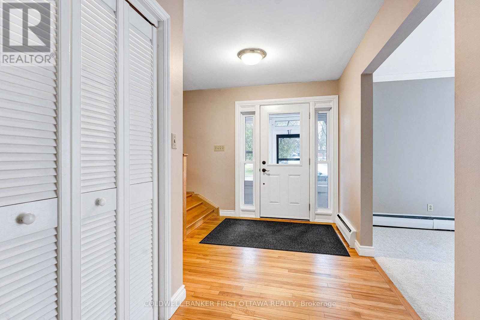 Foyer has convenient closet - 12 Glenview Crescent, Perth, ON - Indoor Photo Showing Other Room