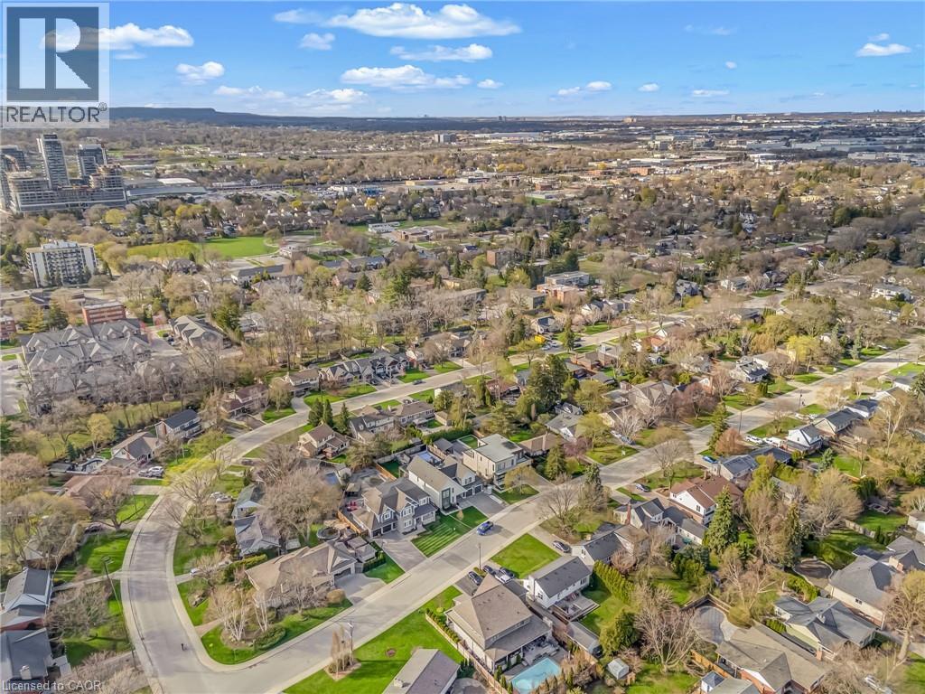 Aerial perspective showcasing a residential neighborhood with established trees and individual properties - 2123 Deyncourt Drive, Burlington, ON - Outdoor With View