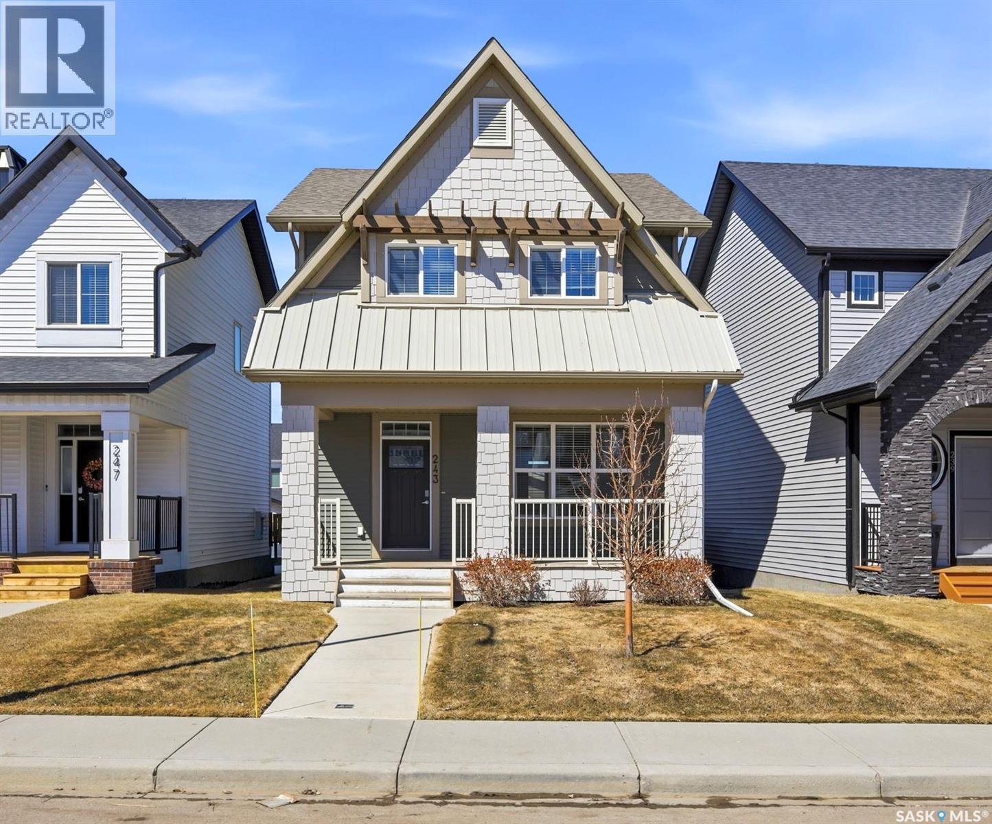 243 Newton Link, Saskatoon, SK - Outdoor With Deck Patio Veranda With Facade