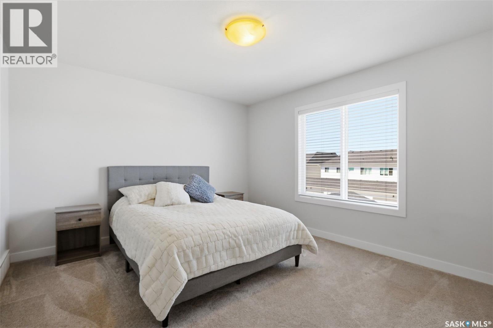 243 Newton Link, Saskatoon, SK - Indoor Photo Showing Bedroom