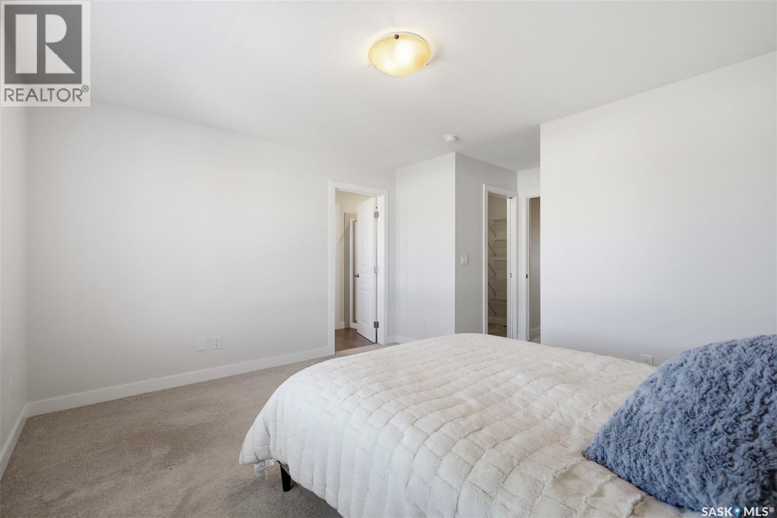 243 Newton Link, Saskatoon, SK - Indoor Photo Showing Bedroom