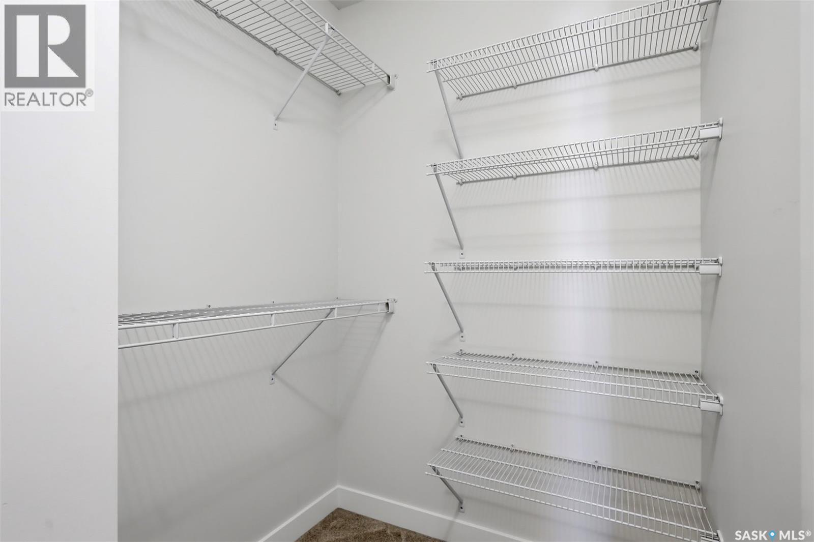 243 Newton Link, Saskatoon, SK - Indoor With Storage