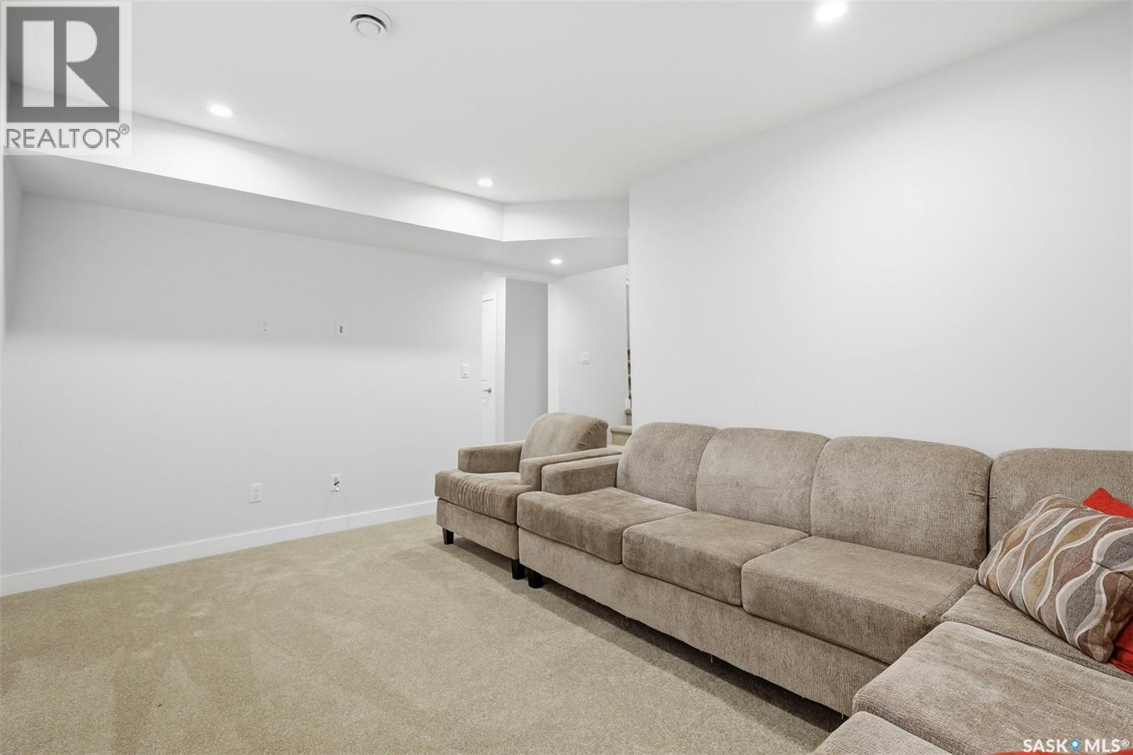 243 Newton Link, Saskatoon, SK - Indoor Photo Showing Living Room