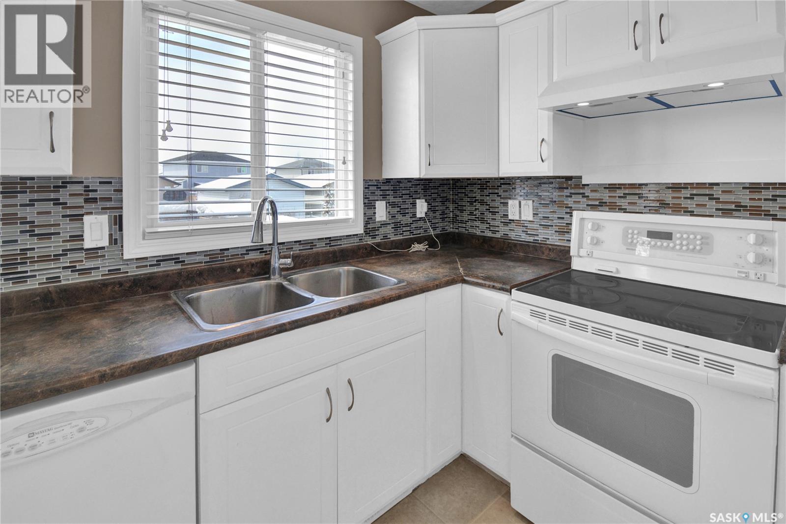 2905 Mcclocklin Road, Saskatoon, SK - Indoor Photo Showing Kitchen With Double Sink