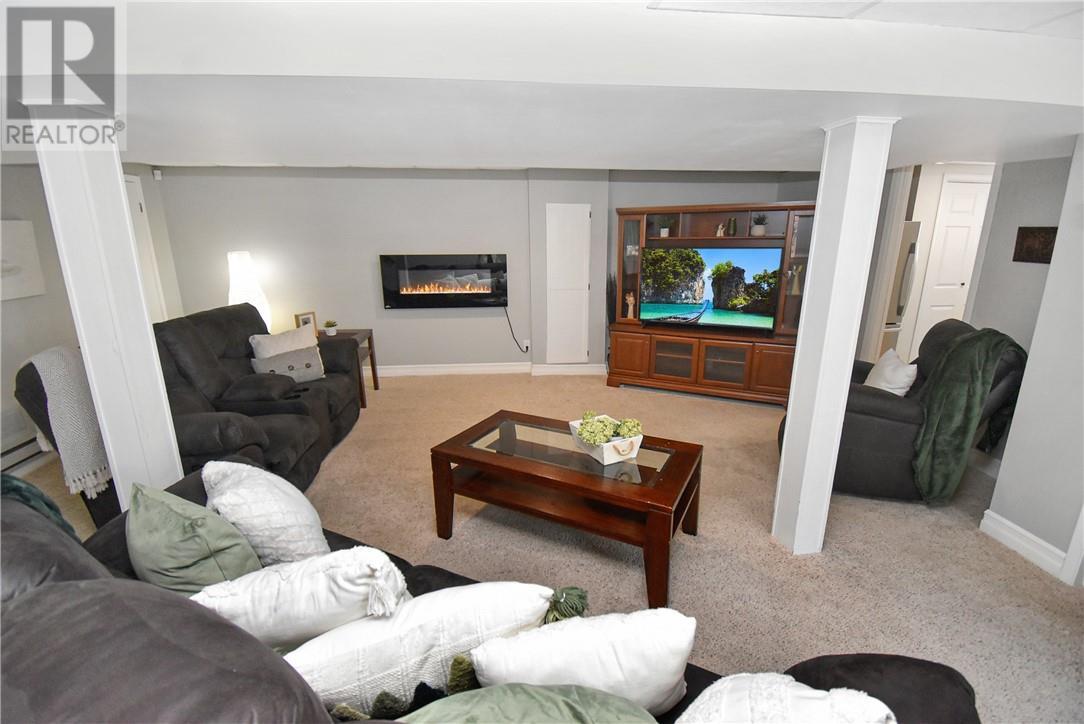 215 Orell St, Garson, ON - Indoor Photo Showing Living Room With Fireplace