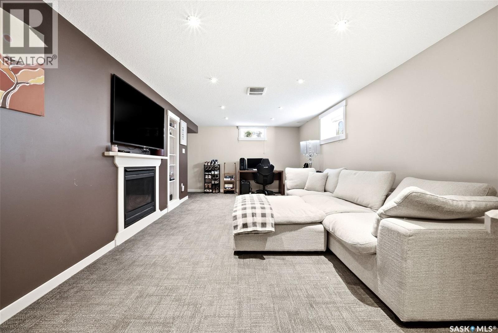 3013 Grant Road, Regina, SK - Indoor Photo Showing Living Room With Fireplace