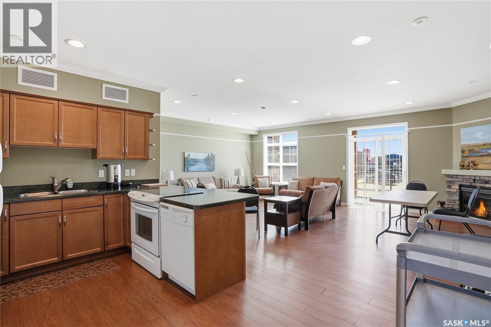 304 218 Heath Avenue, Saskatoon, SK - Indoor With Fireplace