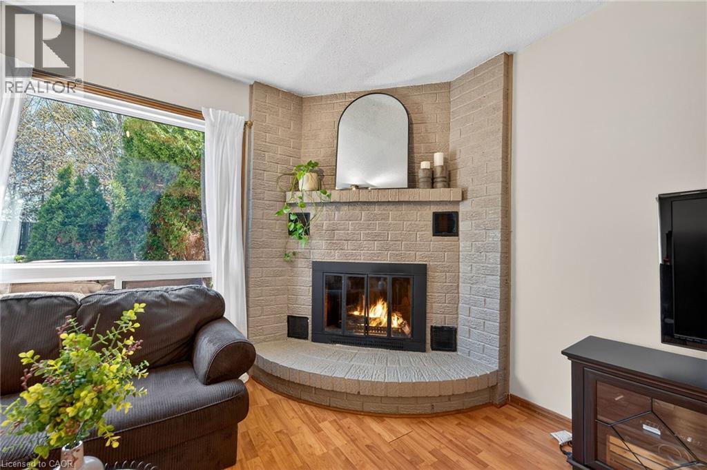 22 Vance Crescent, Waterdown, ON - Indoor Photo Showing Living Room With Fireplace
