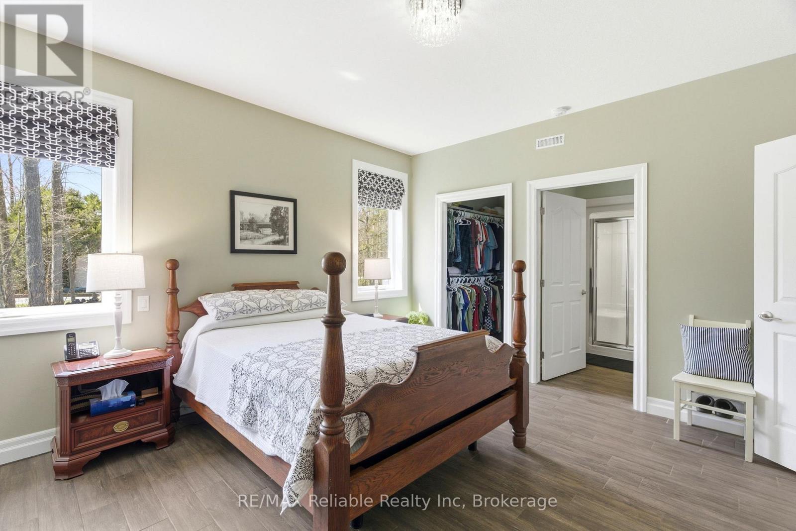 Primary bedroom with walk in closet & ensuite bath - 79055 Kelly Court, Central Huron (Goderich), ON - Indoor Photo Showing Bedroom