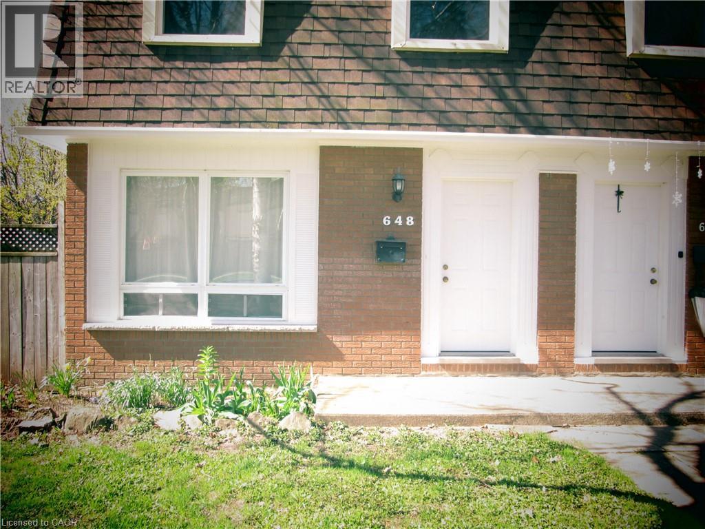 Brick facade with white trim and a brown shingle roof - 648 Francis Road, Burlington, ON - Outdoor