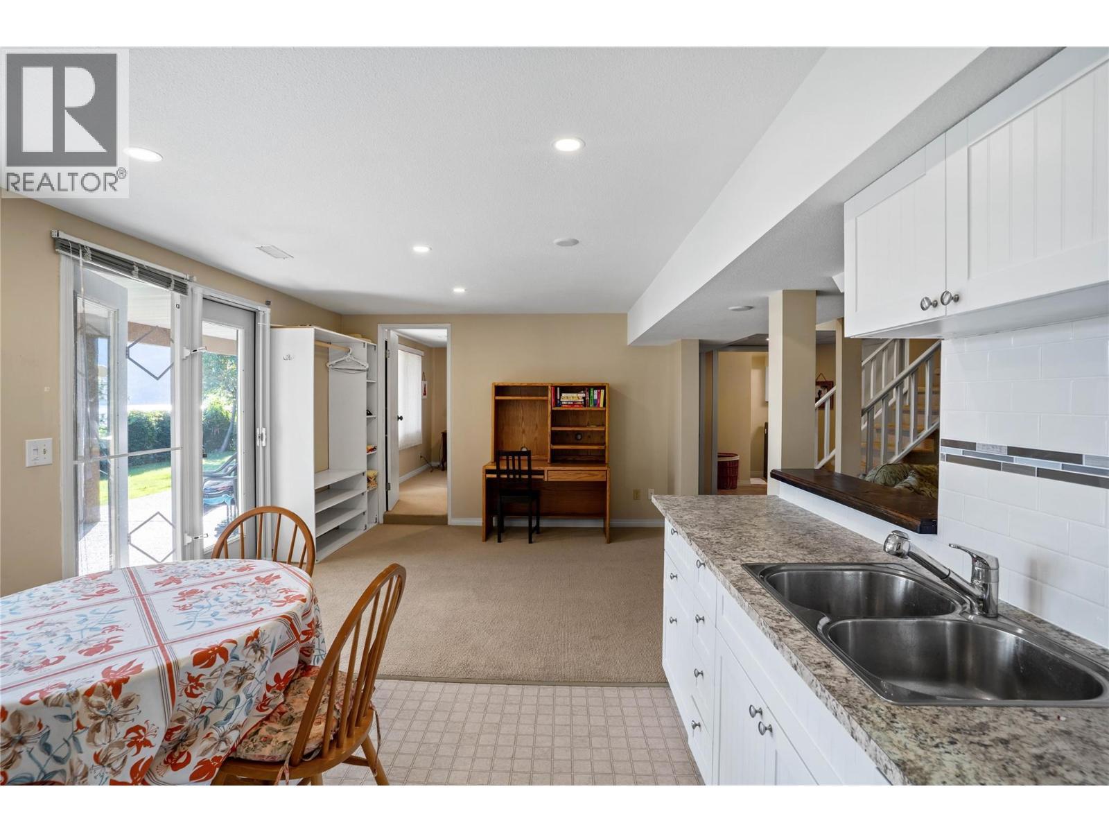 Lower level suite - 1988 Dewdney Road, Kelowna, BC - Indoor Photo Showing Kitchen With Double Sink